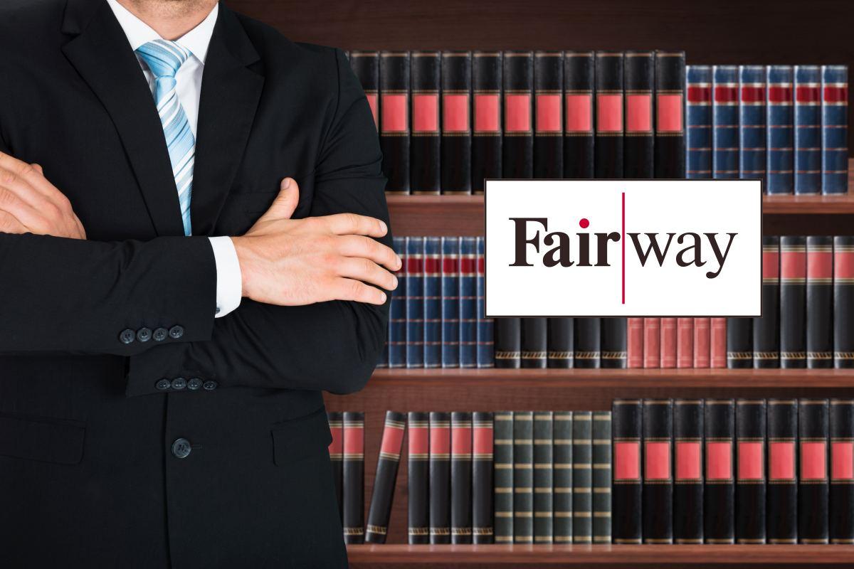 Close-up of Male Lawyer in front of Book-shelf